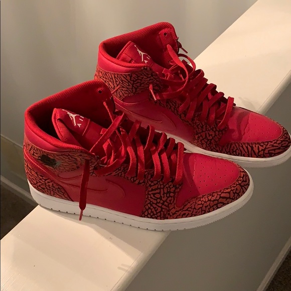 red elephant print jordan 1